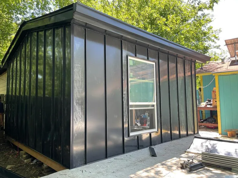 Black standing seam metal wall panels for Metal Roof Installation in South Hadley